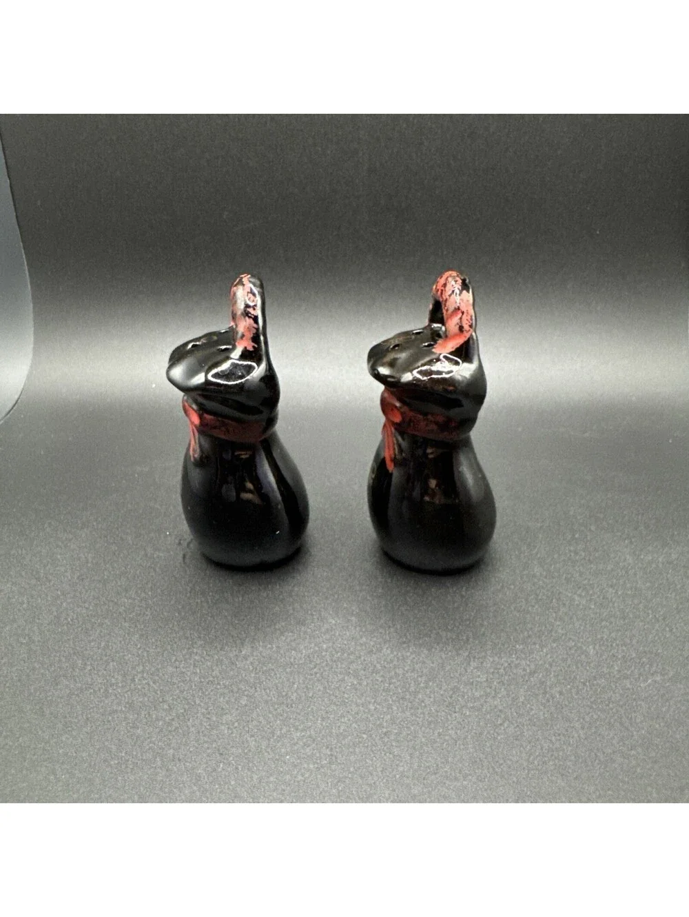 Vintage Black Ceramic Sack Salt and Pepper Shakers Red Bow Handled Set